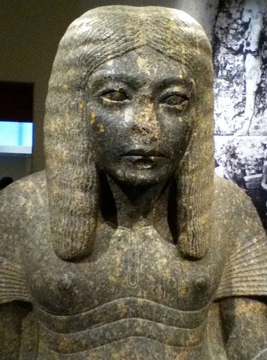 Who or what damaged this statue of the Ancient Egyptian pharaoh Haremheb as a scribe? Did vandals take his nose?