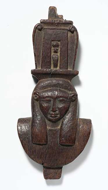 Carved cedar sculpture of the head of Hathor. (Egyptian 16th Dynasty)