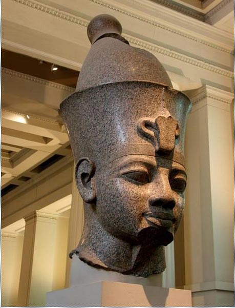 Colossal granite head of Amenhotep III at the British Museum.