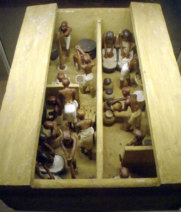 An Egyptian funerary model of a bakery and brewery.