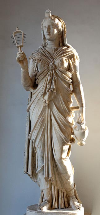 Roman Isis holding a sistrum and oinochoe and wearing a garment tied with a characteristic knot, from the time of Hadrian (117–138 AD).