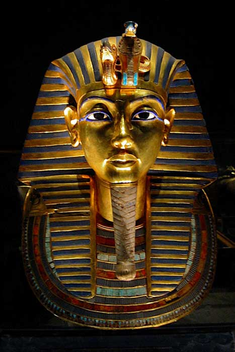 The death mask of Egyptian pharaoh Tutankhamun is made of gold inlaid with colored glass and semiprecious stone