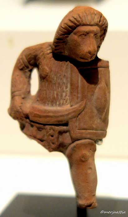 This terracotta figurine depicts                  a monkey in a rare avatar—dressed as a gladiator. Roman                  Period. Musée du Louvre Paris. Exhibition 'Animals and                  Pharaohs', CaixaForum Barcelona.