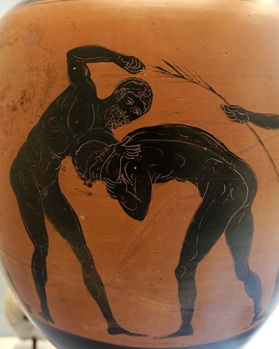 Two athletes competing in the pankration. Panathenaic amphora