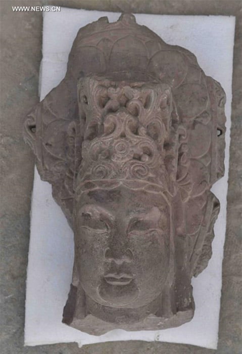 A stone Bodhisattva head unearthed at the excavation site of the Fugan Temple in Chengdu, China