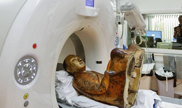 Buddha statue undergoing a CT-Scan.