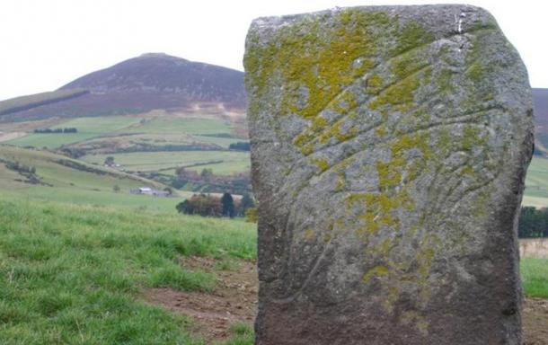 The "Craw Stane", a Pictish symbol stone depicting a salmon and an unknown animal.