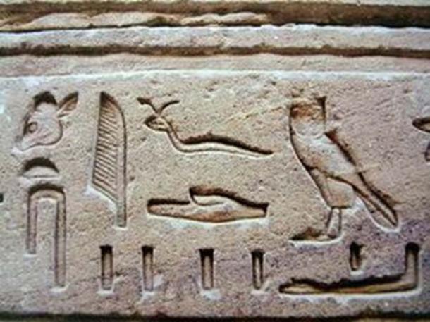 Egyptian hieroglyphs typical of the Greco-Roman period, sculpted in Relief.