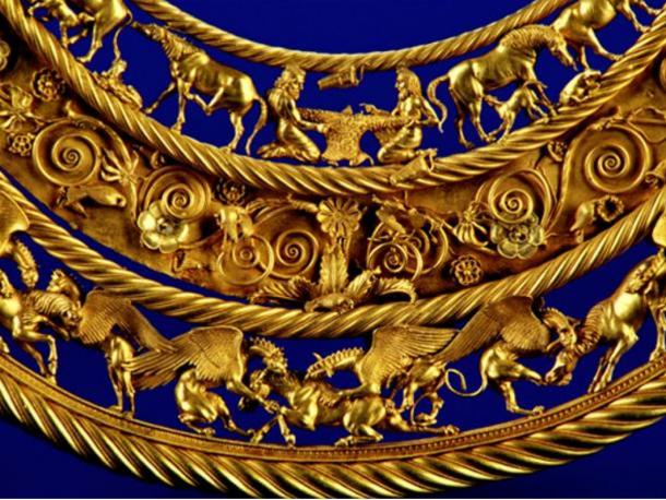 Gold Scythian pectoral, or neckpiece, from a royal kurgan in Tolstaya Mogila, Ordzhonikidze, Ukraine, dated to the second half of the 4th century BC. The central lower tier shows three horses, each being torn apart by two griffins.