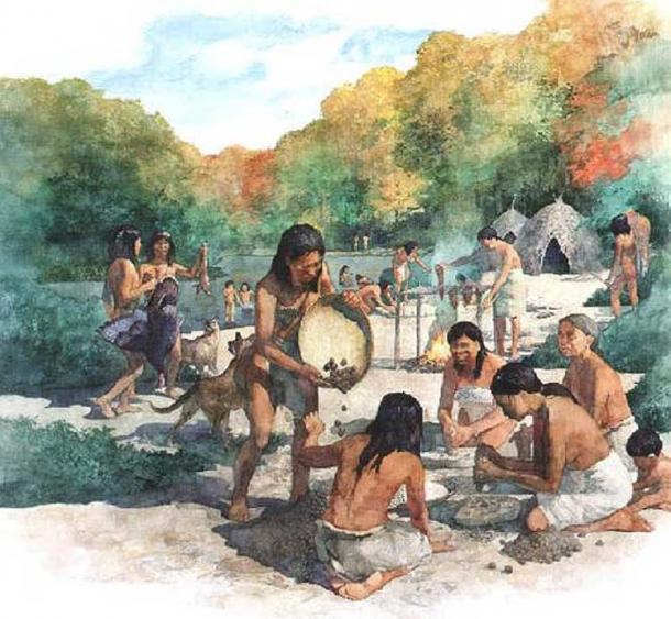 ‘Hunter gatherers at a campsite.’