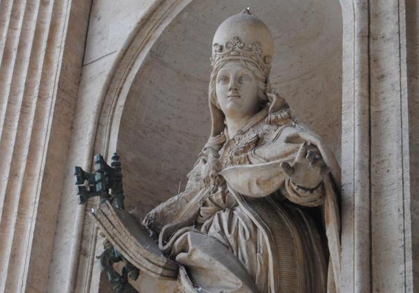 The statue that still stands in Rome is Joanna with a papal crown.