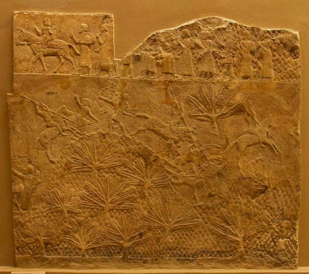 Part of the Lachish Relief, British Museum. Battle scene, showing Assyrian cavalry in action. Above, prisoners are led away.