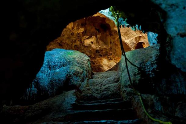Looking inside the sacred Balankanché Cavern.