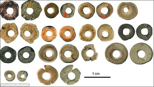 Ostich eggshell beads from Border Cave in South Africa, dated 44,856-41,010.