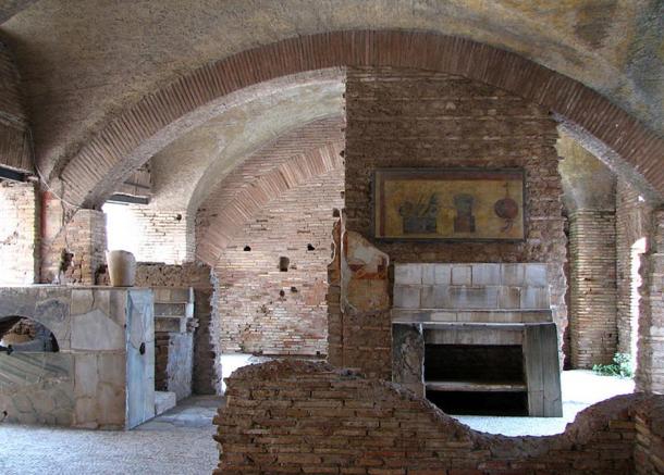 A Pompeiian taberna for eating and drinking. The faded painting over the counter pictured eggs, olives, fruit and radishes.