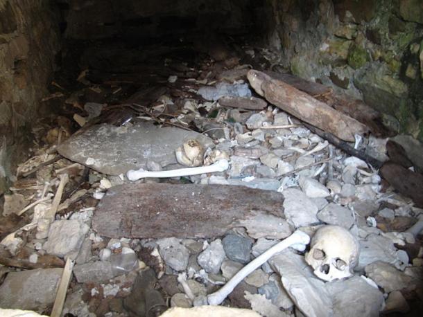Skeletons inside Dargavs Crypt, Russia