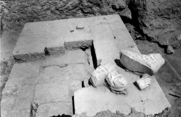An area within the ancient healing temple with fragments from a statue. Greek Ministry of Culture
