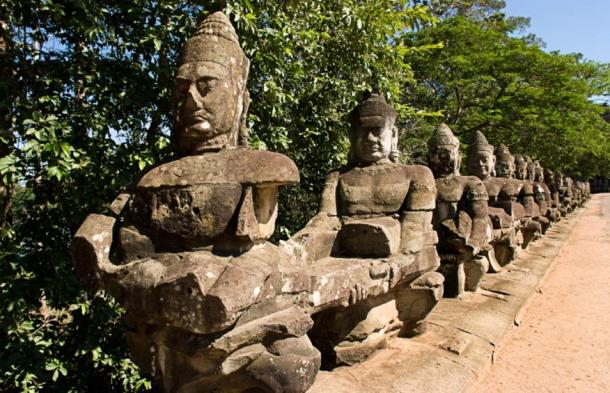 The causeway at Angkor Thom consists of a row of statues pulling on the Serpent King