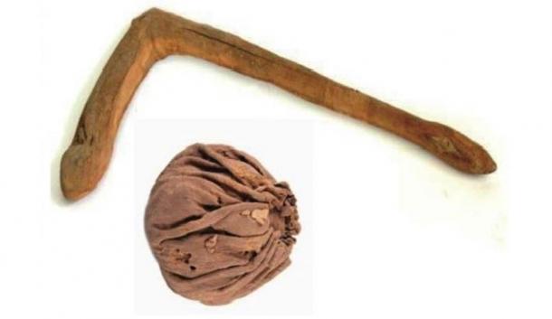 An ancient ball and polo mallet from the Yanghai Tombs 