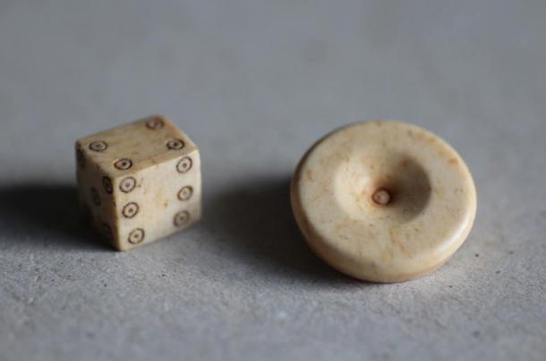 Archaeologist Professor Thomas Maurer and his team of students found some interesting artifacts, including gaming pieces