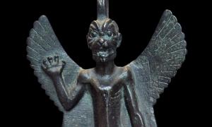 Detail of a bronze statuette of Pazuzu, circa 800 BC - circa 700 BC. Pazuzu was an Assyrian evil spirit believed to frighten away other evil spirits - protecting humans against plagues and misfortunes.