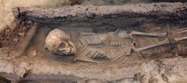The skeleton of a child between the age of 6 and 9 found with various grave goods.