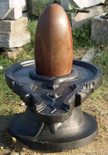 Figure 2. A Hindu lingam, basted with oils, in exactly the same fashion as Jacob's Pillar (Jacob's small conical stone).