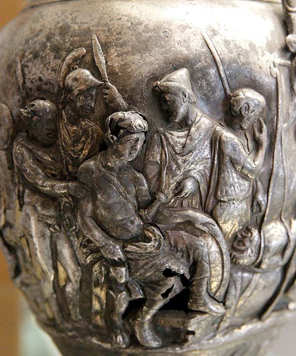 Achilles mourning Patroclus on a silver jug, also from Tutus' votive offering.