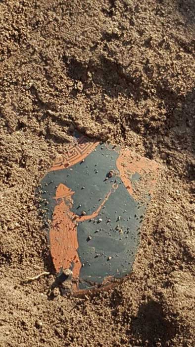 An Attic vase fragment found at the Paestum site in southern Italy. It depicts the Greek god Hermes.