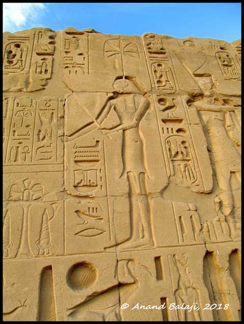 An elegant relief of goddess Seshat carved on the walls of Karnak Temple shows her dressed in her characteristic leopard-skin outfit. A scribe and record-keeper, she was worshipped as the deity of wisdom, knowledge, and writing.