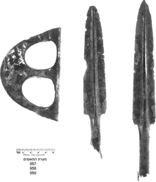 Bronze weapons: an “eye axe” and two socketed spearheads, also found in the cave were used to fend off spirts during divination rituals. (Tal Rogovski/Te’omim Cave Archaeological Project)