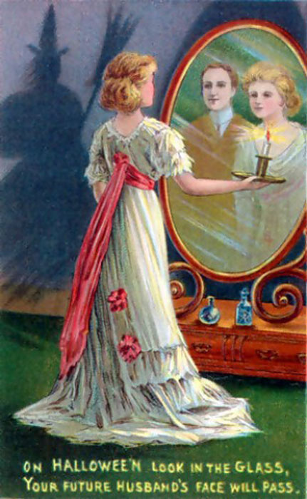 Early 20th century Halloween greeting card showing the legend of Bloody Mary, whereby a young girl will see her future husband reflected in a mirror. (Public domain)