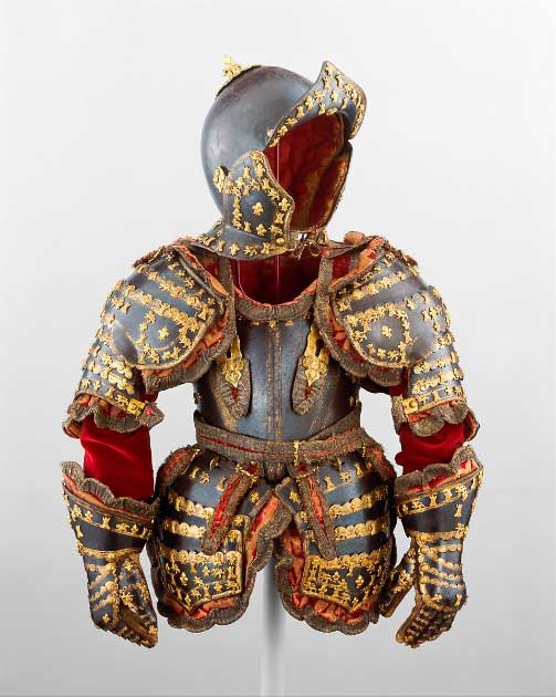 The last royal armor made in Europe. It was presented to the five-year-old Luis, Prince of Asturias (1707 – 1724 AD) by his great-grandfather Louis XIV of France (1638–1715 AD).  It was constructed with steel, gold, brass, silk, cotton, metallic yarn, and paper. Source: Metropolitan Museum of Art / Public Domain