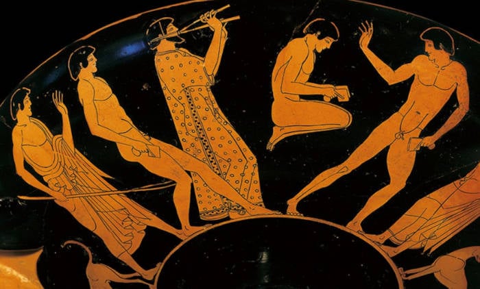 Dancing to music depicted on red and black ceramic painting.
