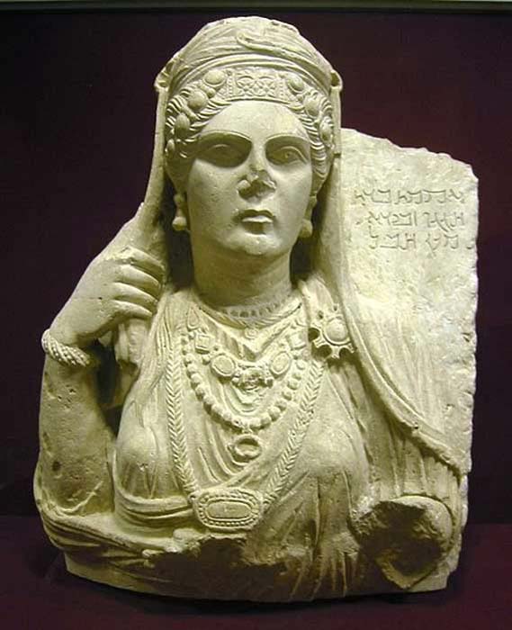 Funerary bust of Aqmat, daughter of Hagagu, descendant of Zebida, descendant of Ma'an, with Palmyrenian inscription. Stone, late 2nd century AD. From Palmyra, Syria. ( CC BY SA 3.0 )