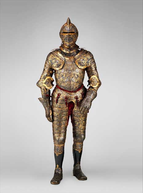 The armor of Henry II, King of France, ca. 1555 AD. This is one of the most elaborate and complete French parade armors. The surfaces are covered by dense foliate scrolls inhabited by human figures and a variety of creatures that derive from the Italian. Weight: 53 lb. 4 oz. (24.20 kg). Source: The Metropolitan Museum of Art, Public Domain.