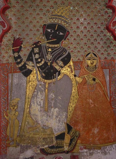 A 14th-century fresco of Krishna on the interior wall of City Palace, Udaipur. Pebble 101