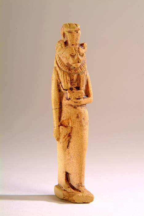 Large limestone amulet figurine of goddess Sekhmet, the lioness, holding the Eye of Horus Wedjat in her left hand. Harrogate Museums and Arts. 