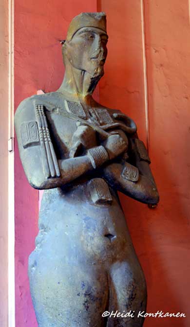 Marked by a grotesque, at times startling, artistic convention; androgynous depictions of Akhenaten in colossal statuary were the result of his religious philosophy that sought to assimilate and embody both male and female characteristics. In short: The Pharaoh wished to be seen as the Creator of Life. From Karnak. Egyptian Museum, Cairo.