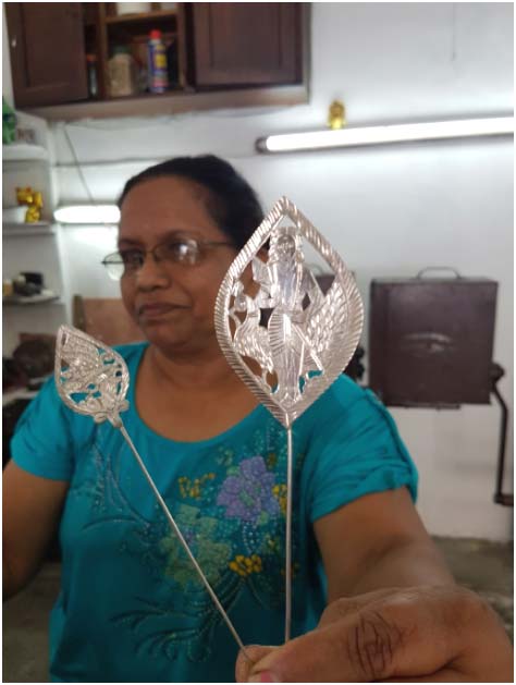 Mrs Poospa Patten displaying her fine examples of silver vels and skewers (Image: Courtesy of the author)