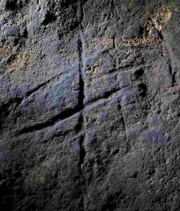 Engraving of Neanderthal in the cave of Gorham, Gibraltar. (AquilaGib / CC BY SA 4.0)