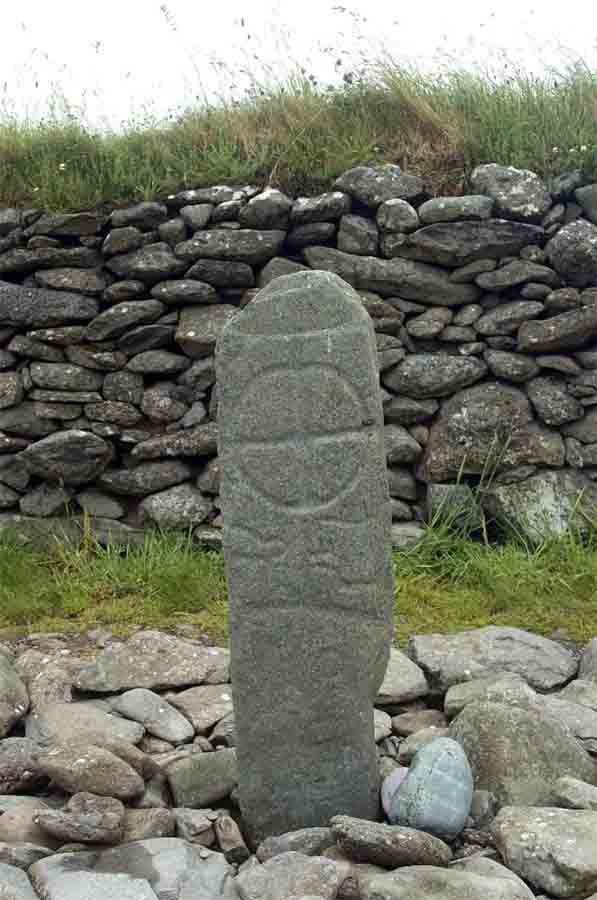 Ogham writing on an old Celtic cross, Gallarus, Ireland. (nyiragongo /Adobe Stock)