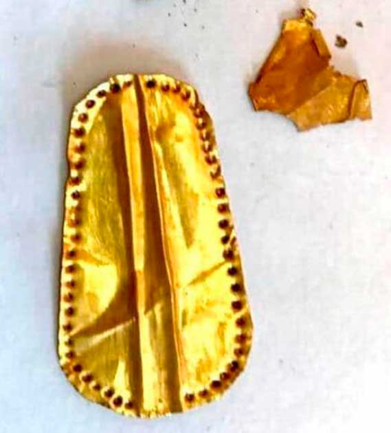 One of the golden tongues found during the excavation. (Egyptian Ministry of Tourism and Antiquities)