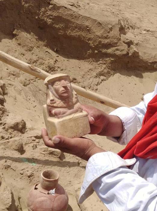 One of the urns depicted “a leader” sitting upon a throne. (CEN)