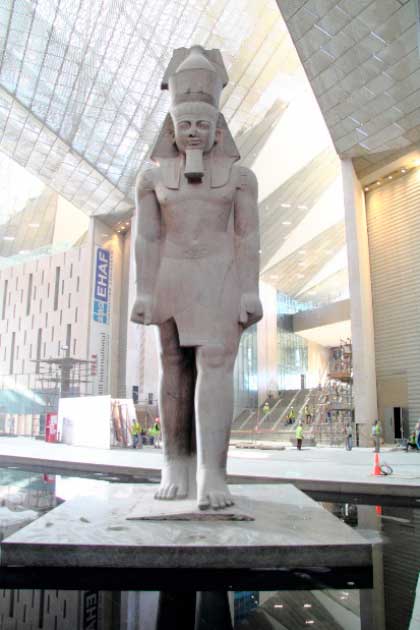 Statue of Ramesses II, also known as Ramses the Great of the Ramessid Dynasty, located in the entrance hall of the Grand Egyptian Museum during construction (Djehouty / CC BY SA 4.0)