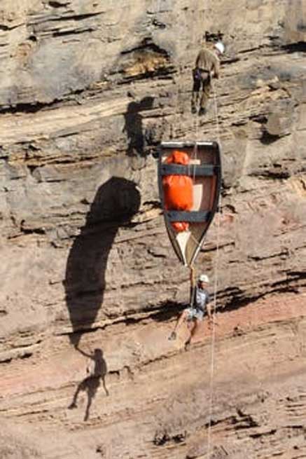 Researchers abseil boat into Arnhem Land sinkhole. (Author provided)