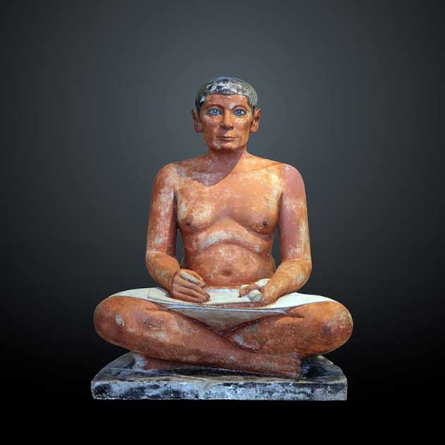 The Seated Scribe, or Le Scribe Accroupi, is an ancient Egyptian artwork which represents a seated scribe at work. Its eyes are inlaid with rock crystal and are one of the first examples of lenses discovered to date. (Rama / CC BY-SA 3.0 FR)