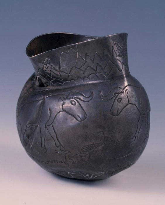 Silver vessel with animal frieze and landscape depiction, found in Large Kurgan of Maikop, Russia. (LibReddit)