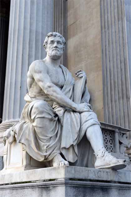 A Statue of the Roman historian Tacitus, by the Austrian sculptor Rudolf Weyr, stands outside the Austrian Parliament in Vienna, Austria. (b201735 / Adobe Stock)