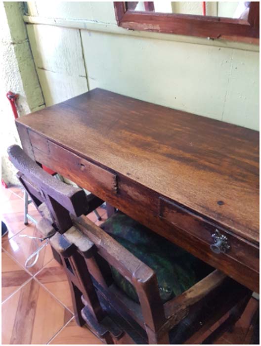 The barber, Mr Bhurtin’s old chair with adjustable neck piece. (Image: Courtesy of the author)